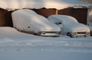 a garage door covered in snow