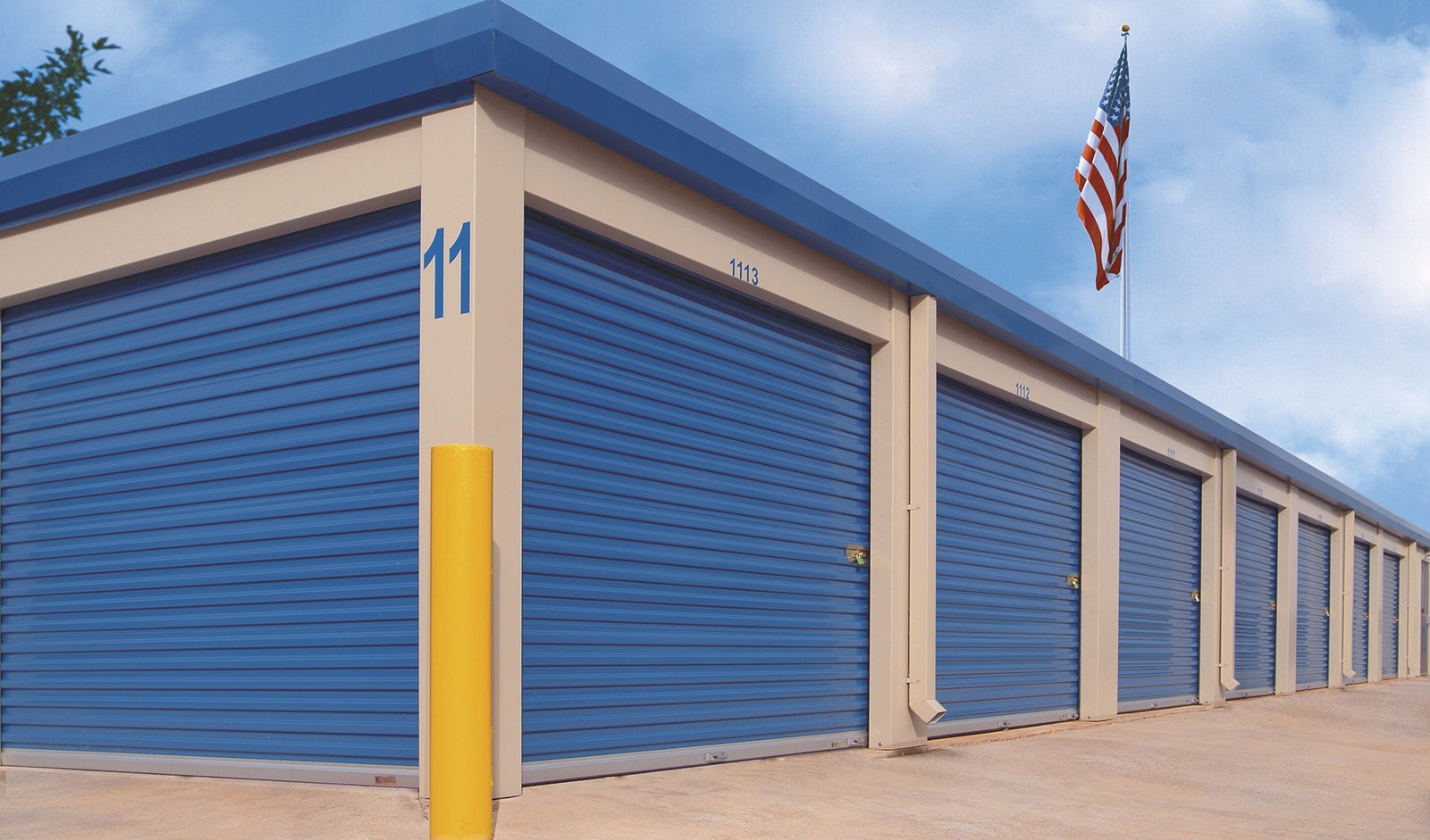 a building with multiple roll up garage doors