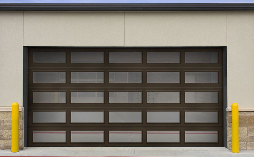 a brown garage door with a lot of windows